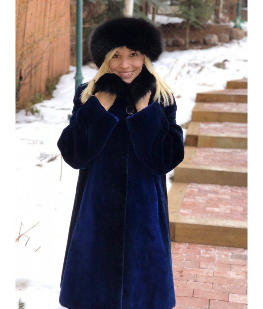 Our dyed blue sheared beaver coat with a fox collar is a stylish and warm piece for winter. The soft, sheared beaver fur in a striking blue offers...