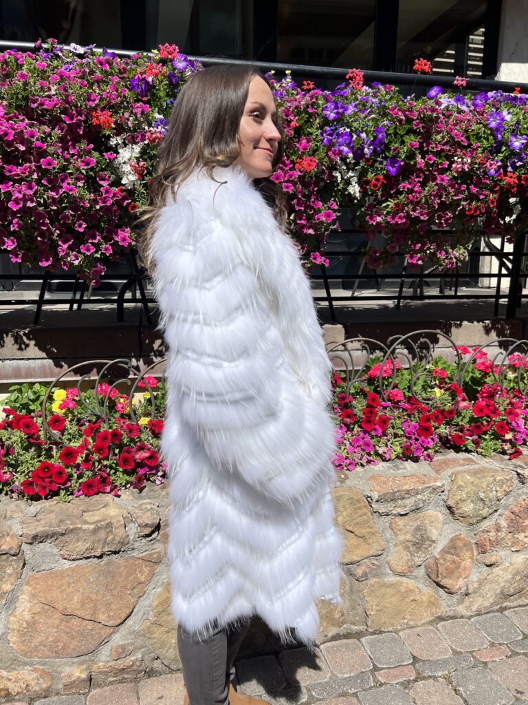 Our women's white raccoon jacket with dyed white rabbit accents combines elegance with comfort. Crafted from white raccoon fur, the jacket has a lush...