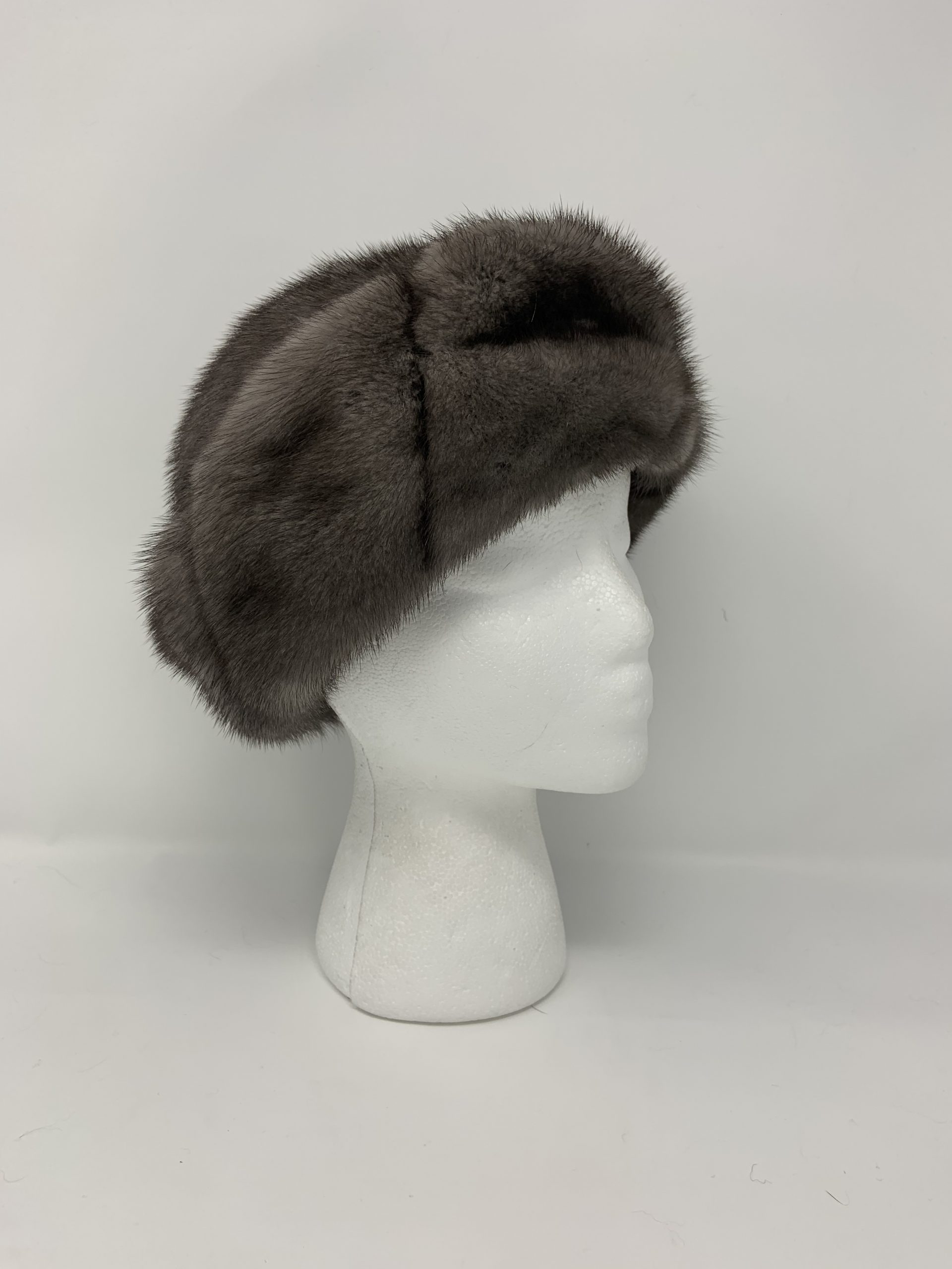 IMG_1831-scaled-1.jpg Our blue iris mink fur hat is a luxe winter accessory. Its stylish design and soft touch add elegance to your winter outfits. Perfect for keeping warm with style.