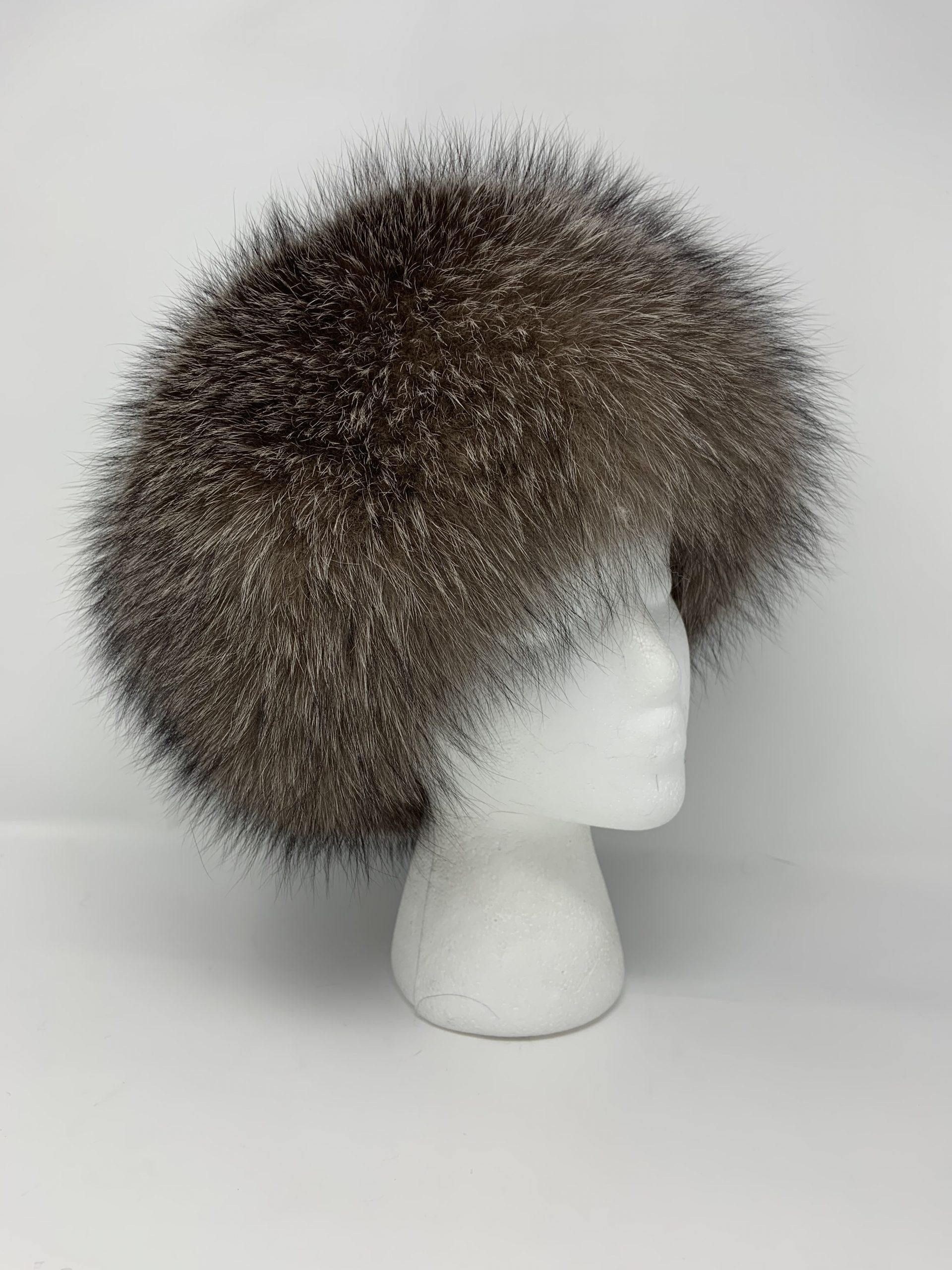 IMG_1871-scaled-1.jpg Our dyed silver indigo fox hat is a stunning piece of winter luxury. The fur's natural luster and softness complements both formal and casual looks.