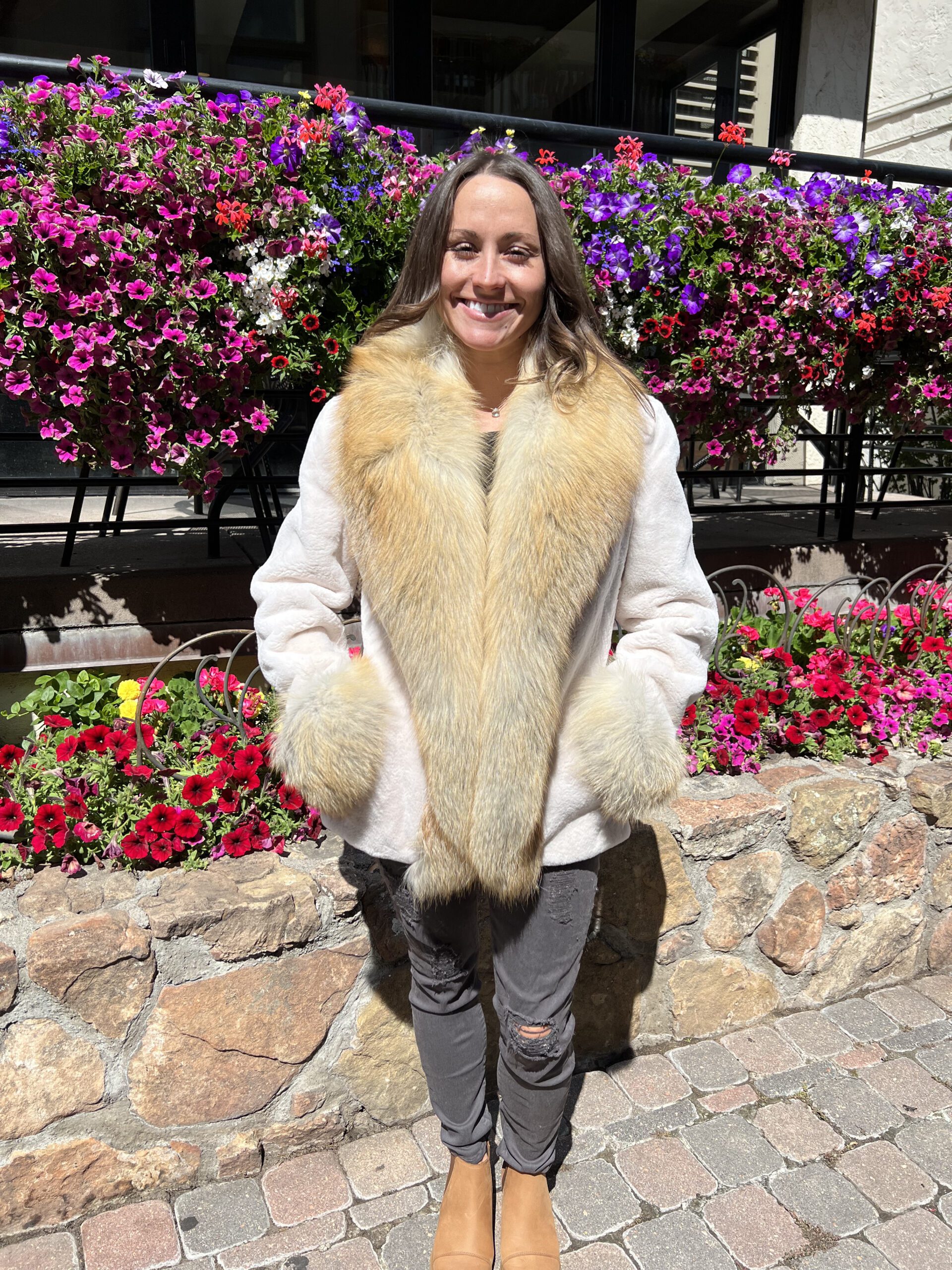 Ivory sheared mink jacket with soft texture and luxurious fox trim collar and cuffs by Fantasia Furs.
