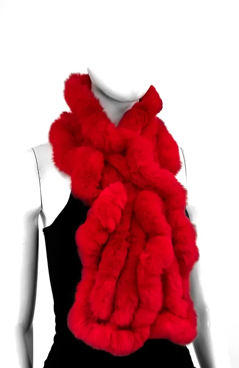 Our red rabbit fur scarf is a cozy and elegant accessory. It adds a touch of luxury to any winter wardrobe. Made from soft rabbit fur, it wraps you in warmth and comfort, perfect for chilly days.