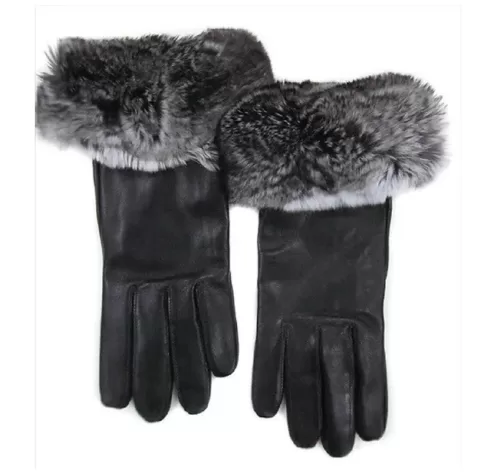 Our black leather gloves with chinchilla trim combine warmth with elegant style. Made from black leather, these gloves are durable and comfortable. The chinchilla trim adds a beautiful touch with its softness and warmth.