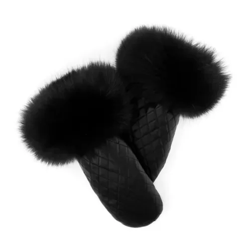 Our quilted black leather mittens with black fox trim blend style with warmth. Made from quilted black leather, these mittens are durable and offer a sophisticated look. The trim of lush black fox fur adds a touch of elegance and softness.