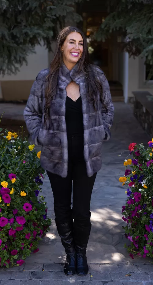 Our reversible blue iris mink coat is versatile and elegant. On one side, the soft blue iris mink fur offers warmth and luxury. On the other, the reversible design provides a sleek alternative. Therefore, this coat lets you switch up your style effortlessly while staying cozy and refined.