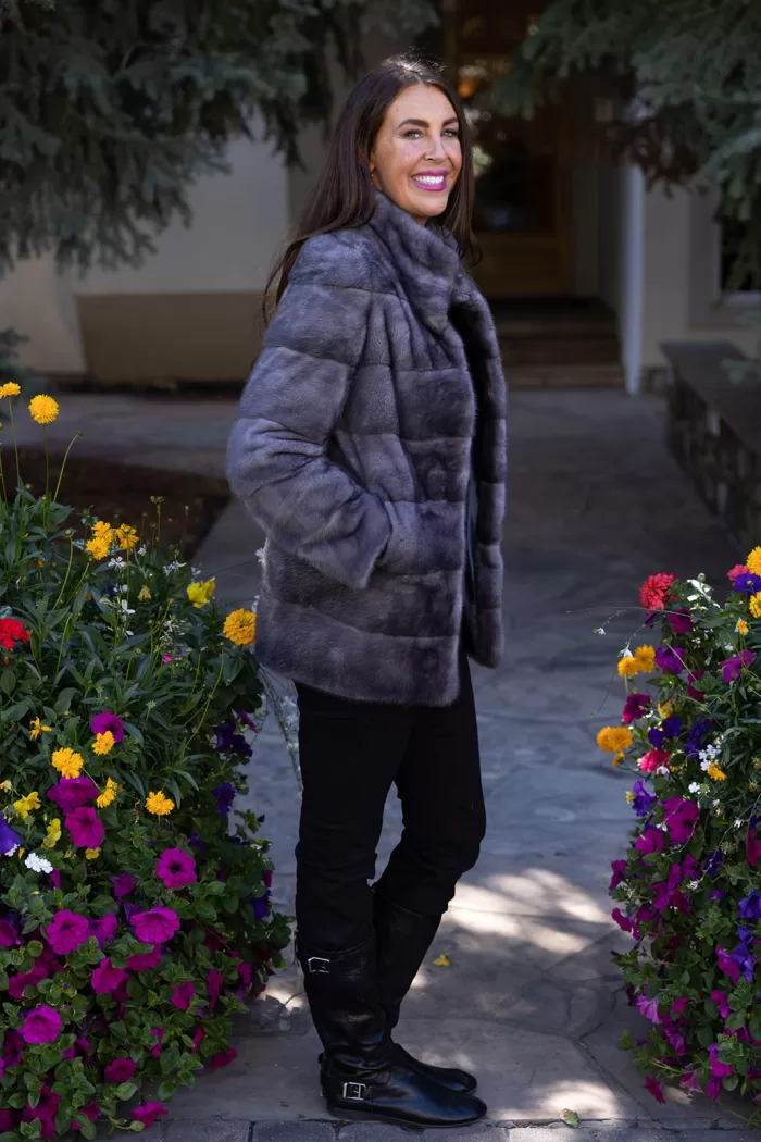 Our reversible blue iris mink coat is versatile and elegant. On one side, the soft blue iris mink fur offers warmth and luxury. On the other, the reversible design provides a sleek alternative. Therefore, this coat lets you switch up your style effortlessly while staying cozy and refined.