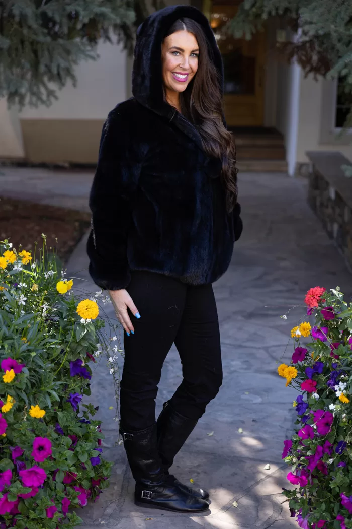 This black ranch mink zip-up jacket combines luxury with practicality. The sleek black mink fur adds elegance, while the zip-up design ensures ease and versatility. This jacket keeps you warm and stylish, making it a perfect choice for any occasion.