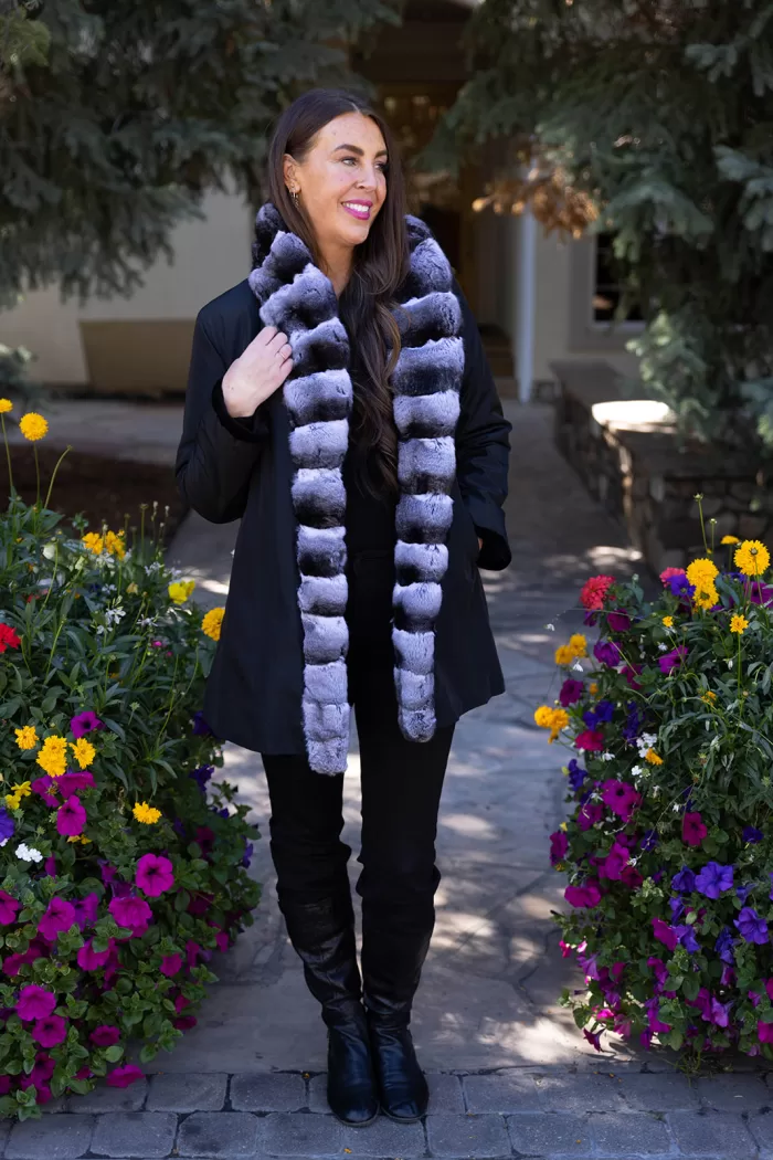 Our black reversible sheared mink coat with chinchilla trim combines luxury and versatility. The sheared mink offers softness and elegance. The chinchilla trim adds texture and sophistication. Its reversible design lets you switch styles effortlessly. This coat keeps you warm while enhancing your look for any occasion.