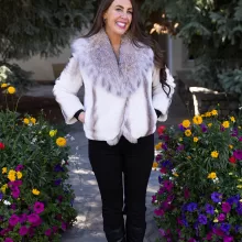 This natural sapphire cross mink jacket with platinum fox trim offers elegance and warmth. The mink’s unique pattern pairs beautifully with the soft platinum fox trim. Additionally, its luxurious design adds a refined touch to any outfit.