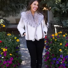 This natural sapphire cross mink jacket with platinum fox trim offers elegance and warmth. The mink’s unique pattern pairs beautifully with the soft platinum fox trim. Additionally, its luxurious design adds a refined touch to any outfit.