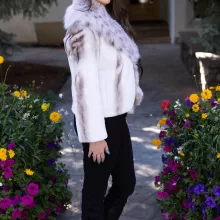 This natural sapphire cross mink jacket with platinum fox trim offers elegance and warmth. The mink’s unique pattern pairs beautifully with the soft platinum fox trim. Additionally, its luxurious design adds a refined touch to any outfit.