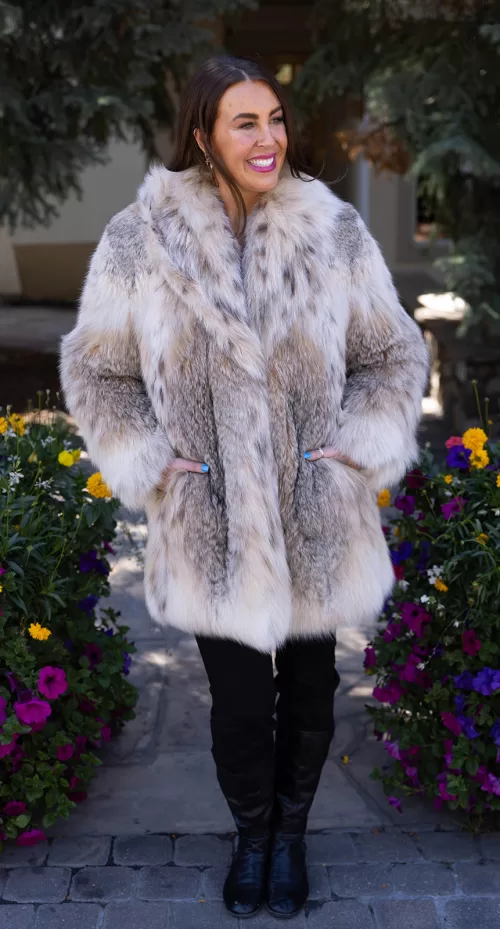 Black sheared mink jacket with soft texture and luxurious lynx fur trim on collar and cuffs by Fantasia Furs.