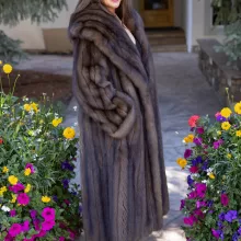 This natural Russian sable coat exudes luxury and warmth. Furthermore, its rich, soft fur offers unmatched comfort and timeless elegance. The classic design complements both formal and casual outfits. This coat is a perfect choice for any winter occasion.