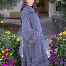 Our dyed blue iris mink swing coat adds elegance and movement to your wardrobe. The rich blue iris mink creates a luxurious look, while the swing design offers a graceful silhouette. This coat keeps you warm and stylish, making it a perfect choice for any occasion.