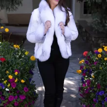 This natural sapphire cross mink jacket with platinum fox trim showcases luxurious style and warmth. The sapphire cross mink fur creates a stunning pattern, while the platinum fox trim adds a soft, elegant contrast. This jacket elevates any outfit, making it a perfect choice for those seeking sophistication and comfort.