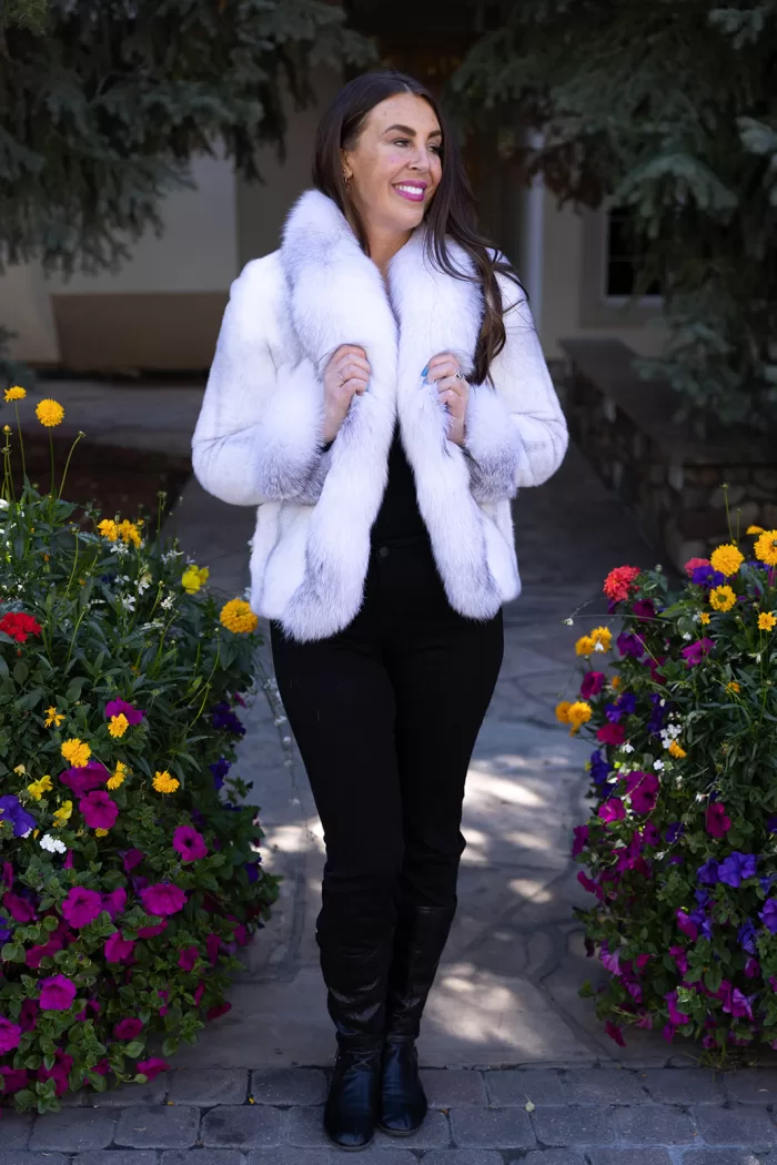 This natural sapphire cross mink jacket with platinum fox trim showcases luxurious style and warmth. The sapphire cross mink fur creates a stunning pattern, while the platinum fox trim adds a soft, elegant contrast. This jacket elevates any outfit, making it a perfect choice for those seeking sophistication and comfort.