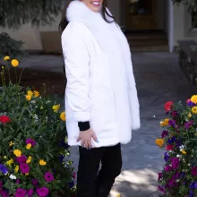 This white reversible mink coat with fox trim combines style and adaptability. The reversible design lets you switch between looks effortlessly. The soft white mink fur radiates elegance and warmth. The fox trim adds a touch of sophistication. As a result, this coat becomes a perfect choice for any occasion.