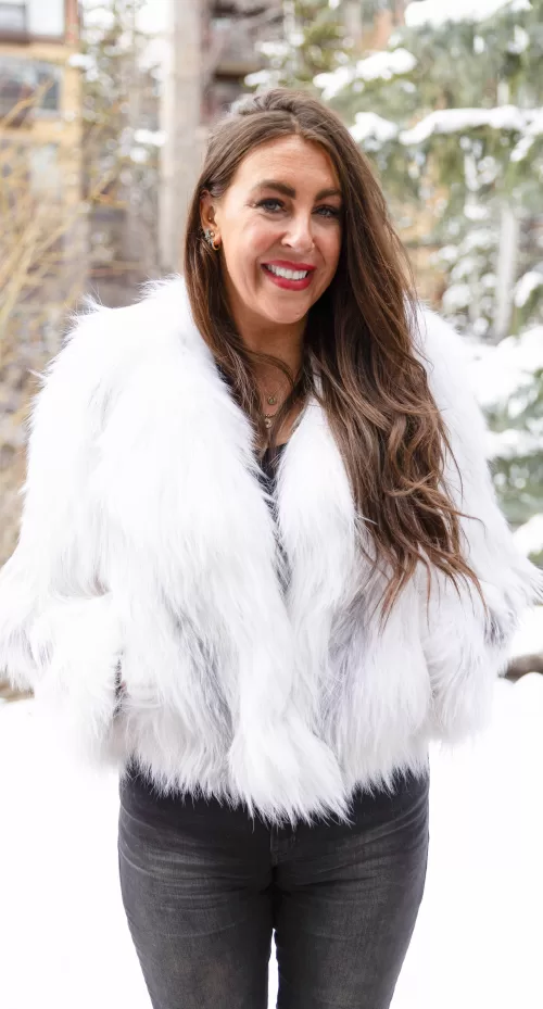 This knitted white fox jacket brings a fresh, modern touch to any outfit. The bright white color creates a clean, elegant look. Additionally, the knit design adds a unique and stylish flair. You will enjoy effortless charm and sophistication.