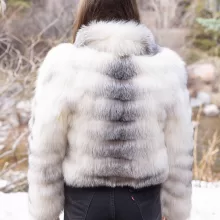 Our natural cross fox jacket features beautiful fur with unique, natural color patterns. The jacket brings subtle elegance to any outfit. Additionally, its distinctive look pairs well with many styles. You will enjoy classic beauty and refined warmth.