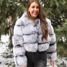 Our black with white tip fox jacket exudes striking elegance and unique style in every detail. The deep black fur contrasts beautifully with the white-tipped accents. Moreover, the jacket adds a bold, luxurious statement to any outfit. You will turn heads wherever you go.