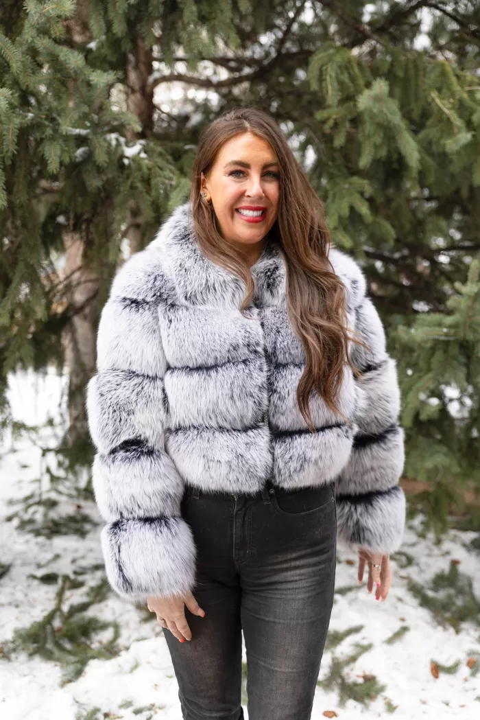 Our black with white tip fox jacket exudes striking elegance and unique style in every detail. The deep black fur contrasts beautifully with the white-tipped accents. Moreover, the jacket adds a bold, luxurious statement to any outfit. You will turn heads wherever you go.