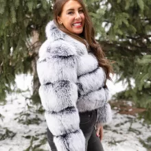 Our black with white tip fox jacket exudes striking elegance and unique style in every detail. The deep black fur contrasts beautifully with the white-tipped accents. Moreover, the jacket adds a bold, luxurious statement to any outfit. You will turn heads wherever you go.