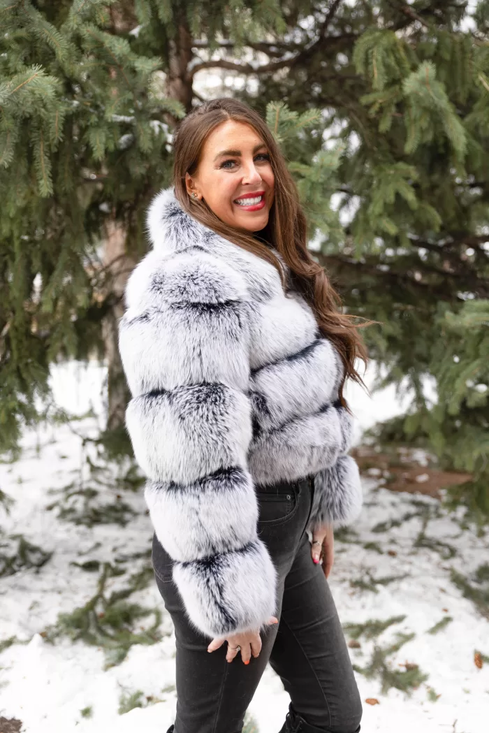 Our black with white tip fox jacket exudes striking elegance and unique style in every detail. The deep black fur contrasts beautifully with the white-tipped accents. Moreover, the jacket adds a bold, luxurious statement to any outfit. You will turn heads wherever you go.