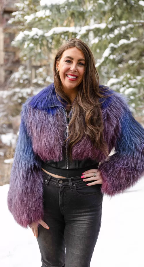 This knitted multi-colored fox jacket showcases vibrant hues woven into a cozy, stylish design. The rich colors create a playful, eye-catching look. Additionally, the soft knit adds warmth and comfort for cold days. You will enjoy both bold style and cozy elegance.
