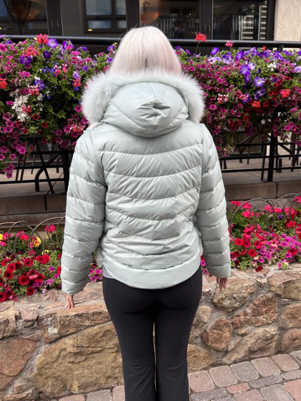 Introducing our mint green reversible down jacket with rabbit fur vest and fox fur trim hood. This jacket allows you to adapt your outfit to changing...