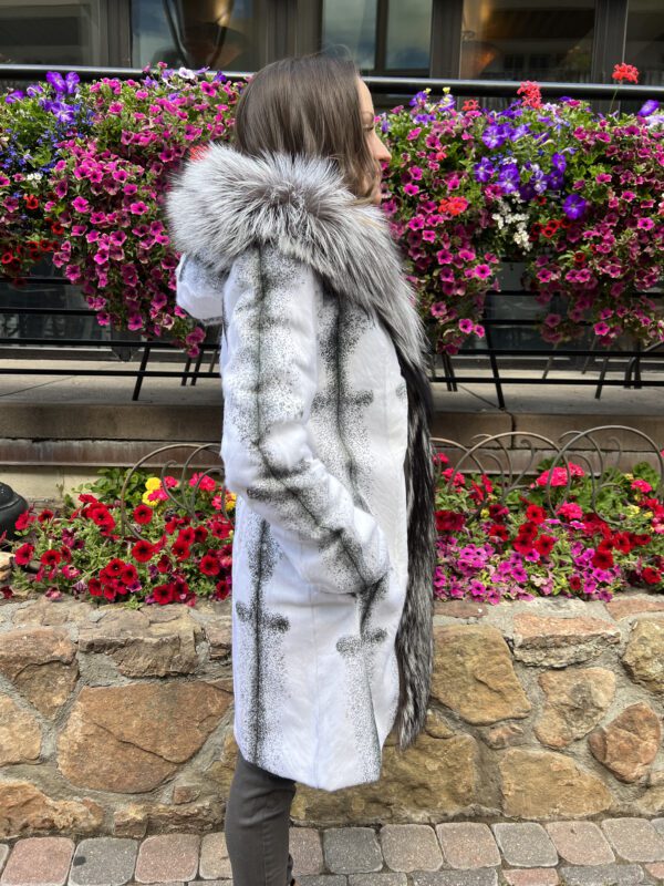 Our dyed goat skin jacket with silver fox tuxedo trim offers a unique and vibrant look. This jacket has a distinct texture that's both eye-catching and...