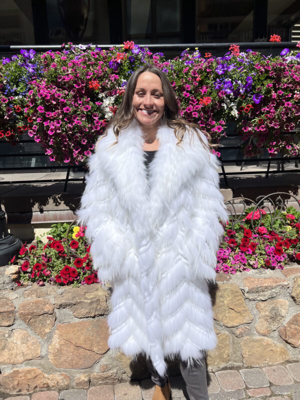 Our women's white raccoon jacket with dyed white rabbit accents combines elegance with comfort. Crafted from white raccoon fur, the jacket has a lush...