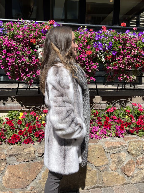 Our natural black cross mink jacket with natural silver fox trim is a stunning piece that is elegant and luxe. This combination of mink and fox fur...