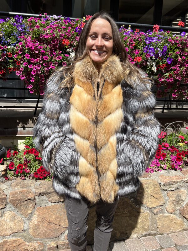 Our natural silver and red fox jacket is a blend of elegance and visual appeal. This piece combines the soft, dense fur of silver fox with the vibrant...