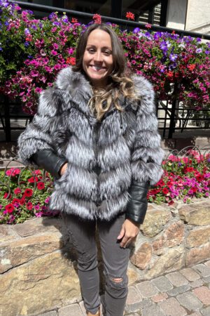 This hooded natural silver fox jacket with detachable black leather sleeves offers style and versatility. Its design ensures functionality, featuring...