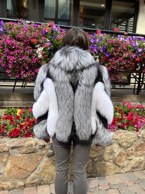 Our zip-up fox fur jacket combining natural silver fox, white fox, and black rabbit fur is a statement of luxury. This unique combination of furs makes...
