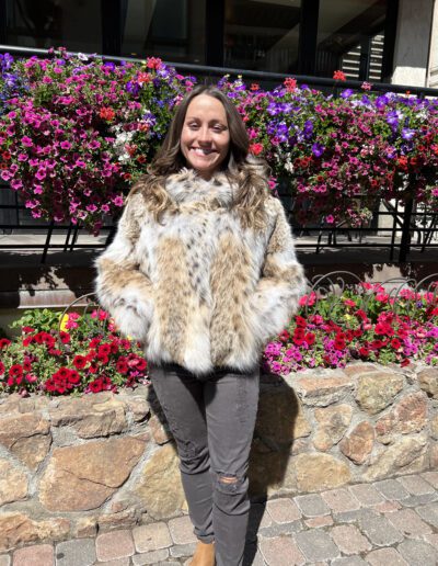 Ideal for those seeking a blend of elegance and practicality. This plush American Lynx Jacket with a hood is perfect for adding luxury to winter attire.