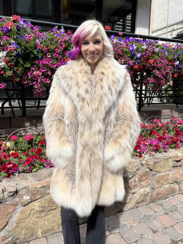 Our women's Canadian lynx coat adds a statement of luxury to any outfit. Made from soft, warm, plush lynx fur, this jacket offers comfort and protection against the cold. Its design emphasizes lynx fur's distinctive texture and colors, making it suitable for both formal and casual occasions.