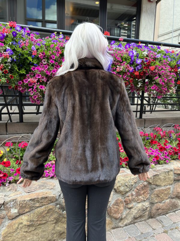 Our zip-up natural mahogany mink jacket combines function with luxe style. Made from mahogany mink fur, it has a deep brown color and is soft...