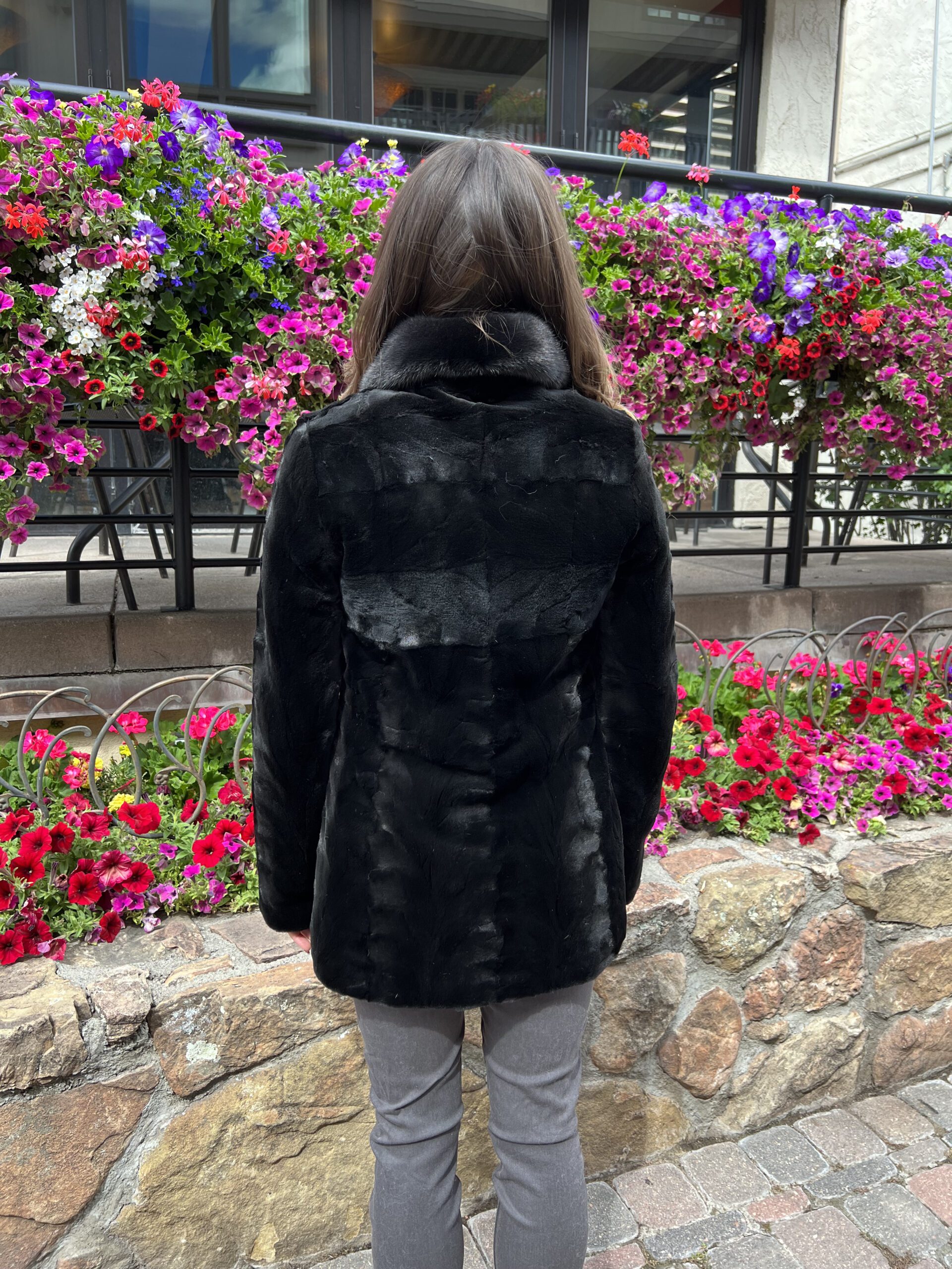 This dyed black sheared mink jacket with drawstring waist is elegant and has a modern design. It has a inner drawstring, that allows for an adjustable...