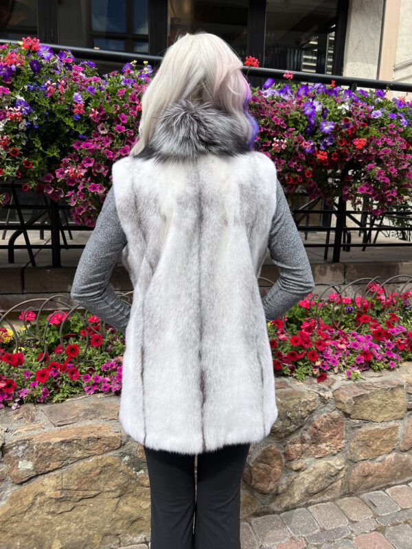 Our natural black cross mink vest with natural silver fox tuxedo trim combines sophistication and luxury. The tuxedo trim gives it a formal edge...