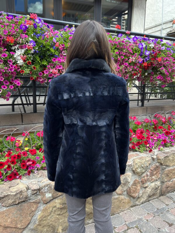 Our midnight blue sheared mink jacket with drawstring waist is a stunning piece that blends luxury with a modern twist. The deep blue color and soft...