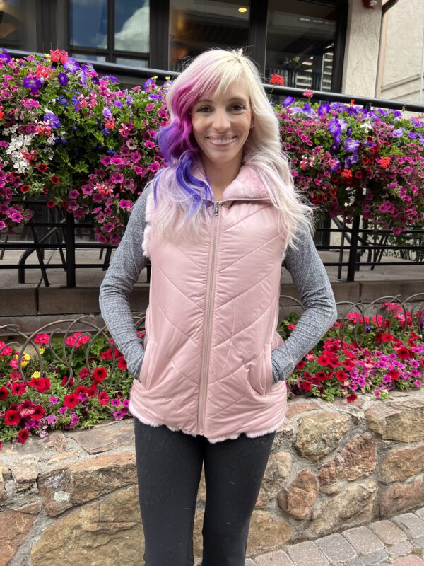 Made from luxurious dyed pink rabbit fur, this reversible vest combines comfort and style. It is perfect for adding a pop of fun to any outfit...