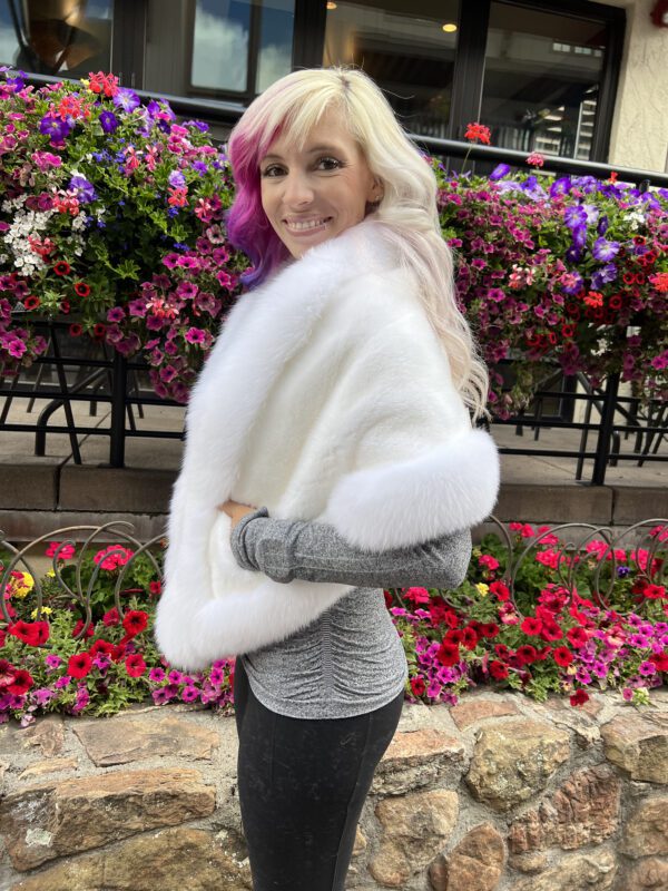 Our white mink shawl with fox trim combines the softness of mink with the plush texture of fox fur. This combination creates a sophisticated and stylish...