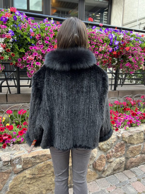 Our knitted mink shawl/jacket with fox trim is elegant and cozy. This piece combines the timeless appeal of mink fur with the bold look of fox fur...
