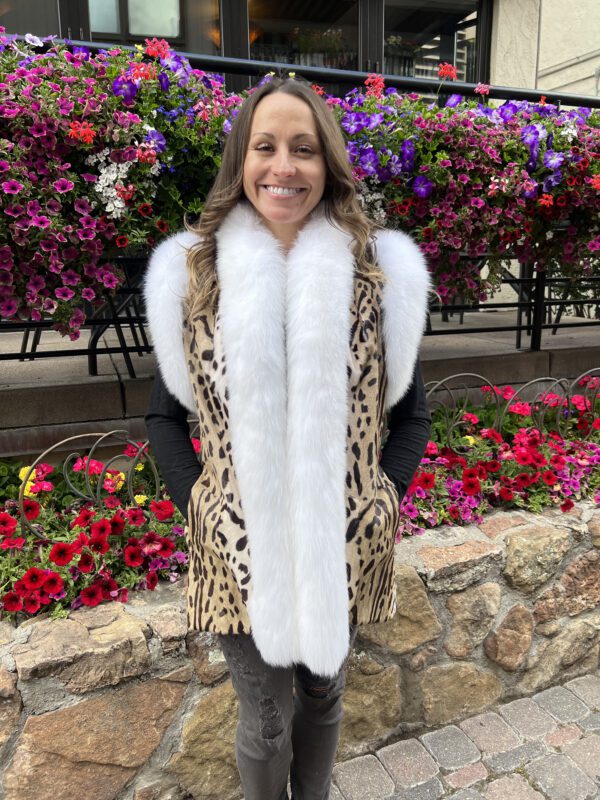 Our dyed animal print goat skin vest with white fox fur trim has a wild allure and luxe softness. Ideal for those who appreciate unique style and the...