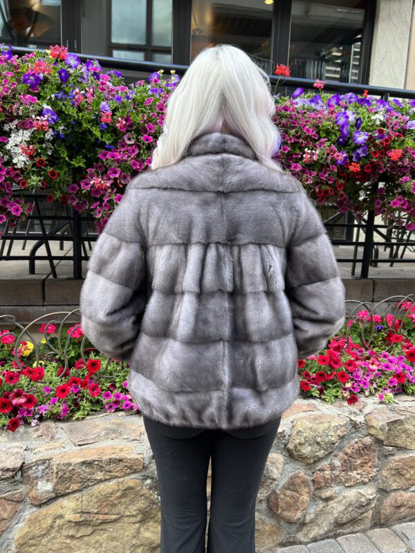 Our natural blue iris mink jacket is a luxurious garment that captivates with its vibrant hue. This jacket is elegant and comfortable...