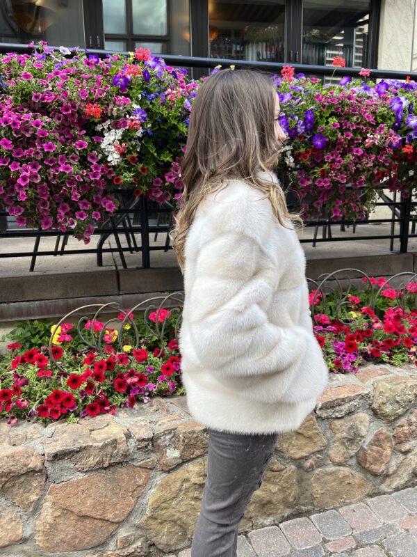 Our natural pearl mink fur jacket is simple and elegant. The natural colors complement both formal and casual outfits. This jacket is comfortable...