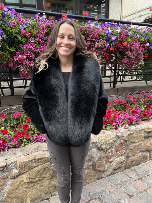 Our dyed black ranch mink jacket with dyed black fox trim is warm and sophisticated. This jacket is perfect for any occasion that calls for a bit of...