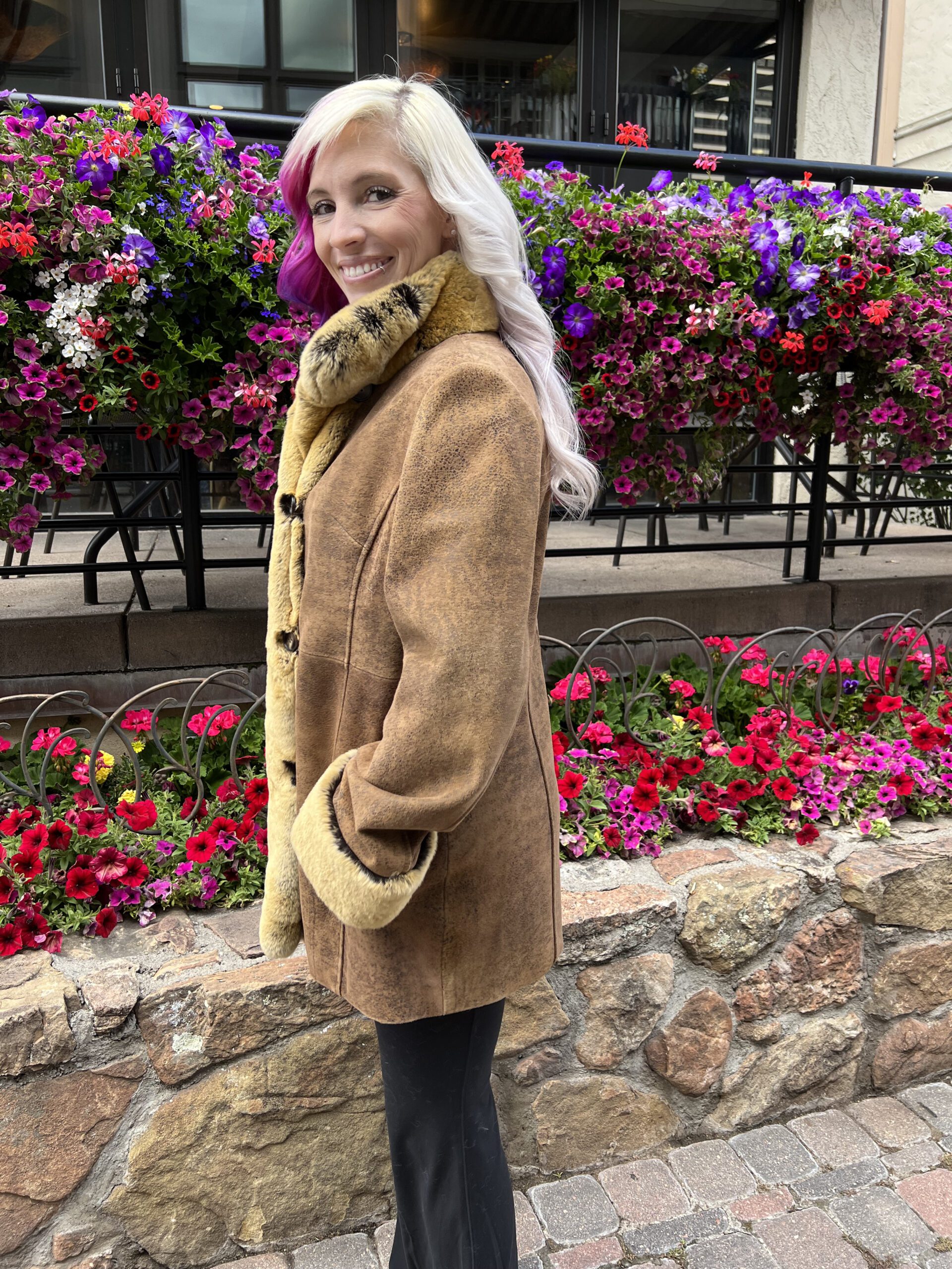 Our camel colored leather jacket with dyed rabbit fur trim combines classic style and warmth. Ideal for transitioning between seasons or adding...