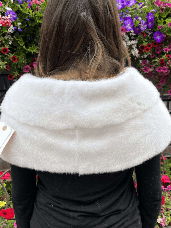 Our classic white mink stole is an elegant accessory. Perfect for evening gowns, wedding dresses, or as a sophisticated touch to everyday wear.